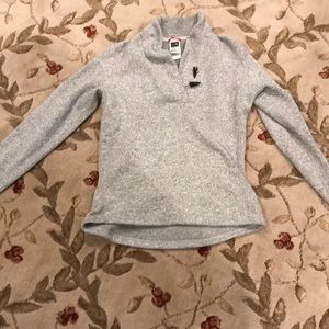 North Face size small pullover jacket.